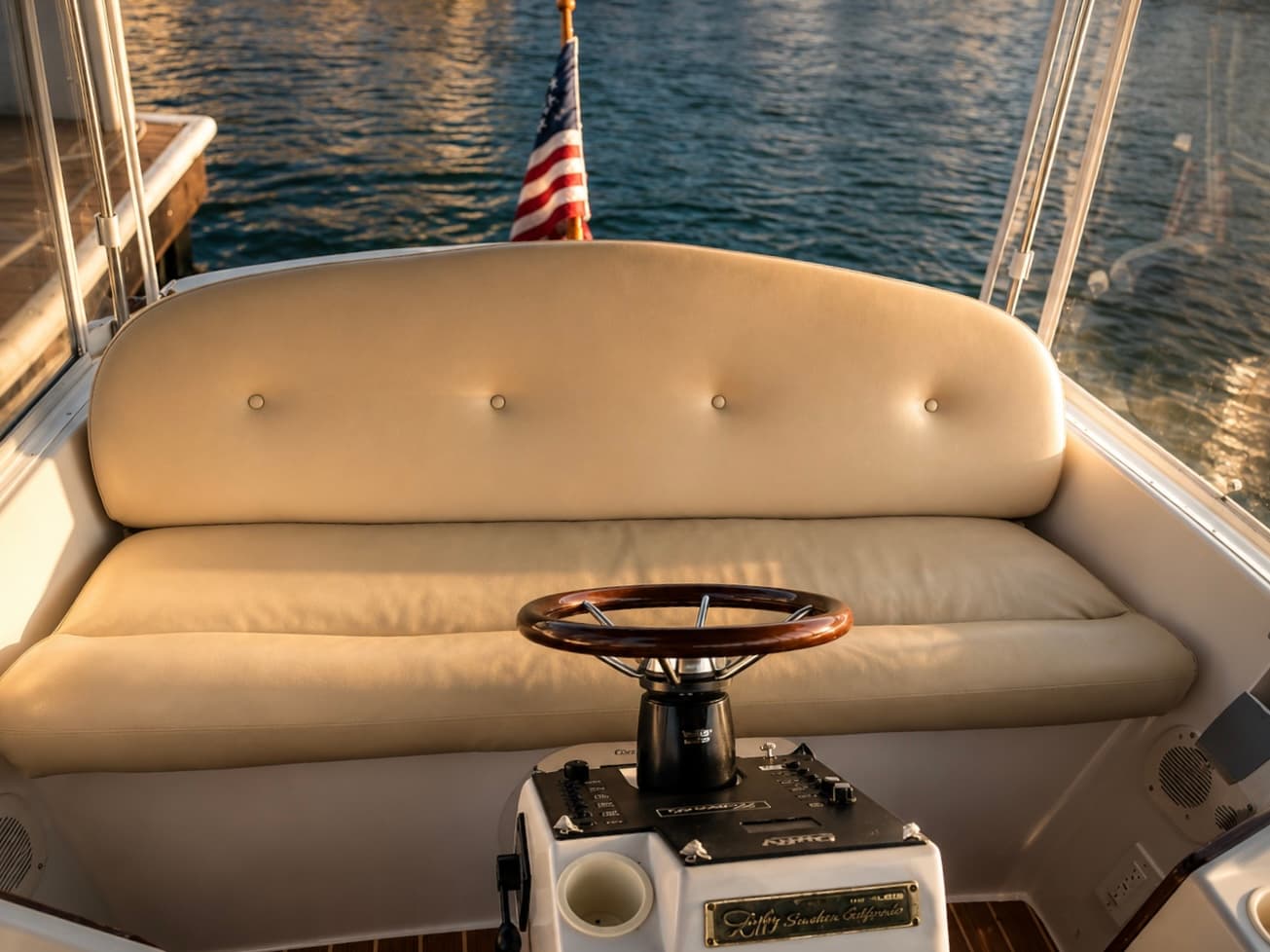 Premium Duffy cream cushions and marine upholstery — interior seating with helm detail